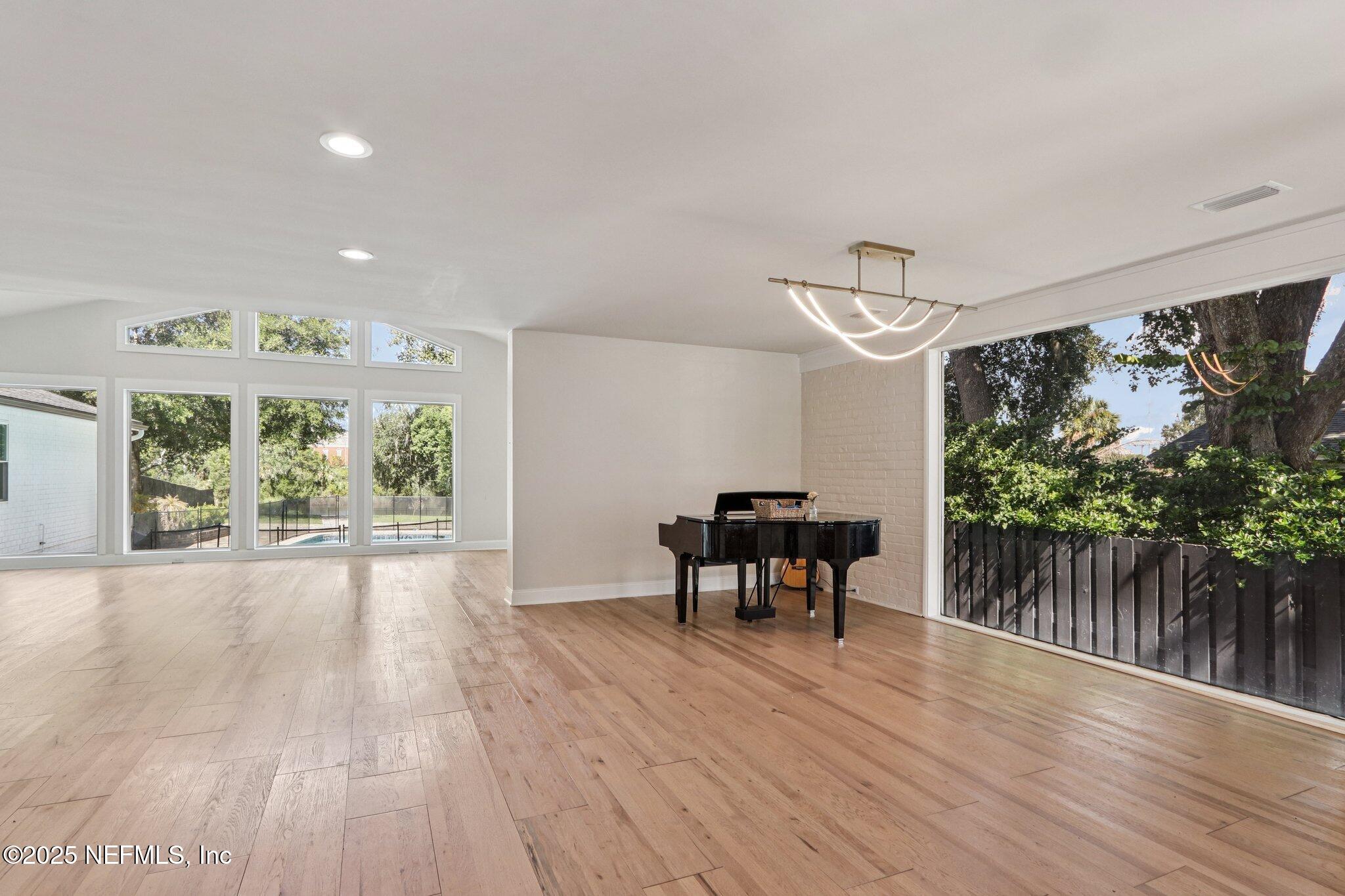 1536 Mayfair Road Jacksonville, FL 32207 - Photo 10 of 58 a view of a porch with wooden floor and outdoor space