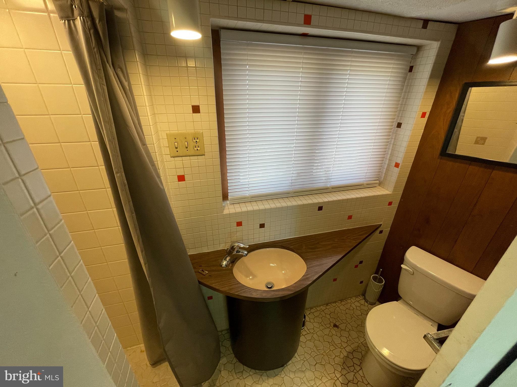 189 Morris Road Harleysville, PA 19438 - Photo 19 of 33 a bathroom with a sink and a mirror