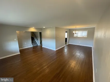 a kitchen with a refrigerator stove and sink