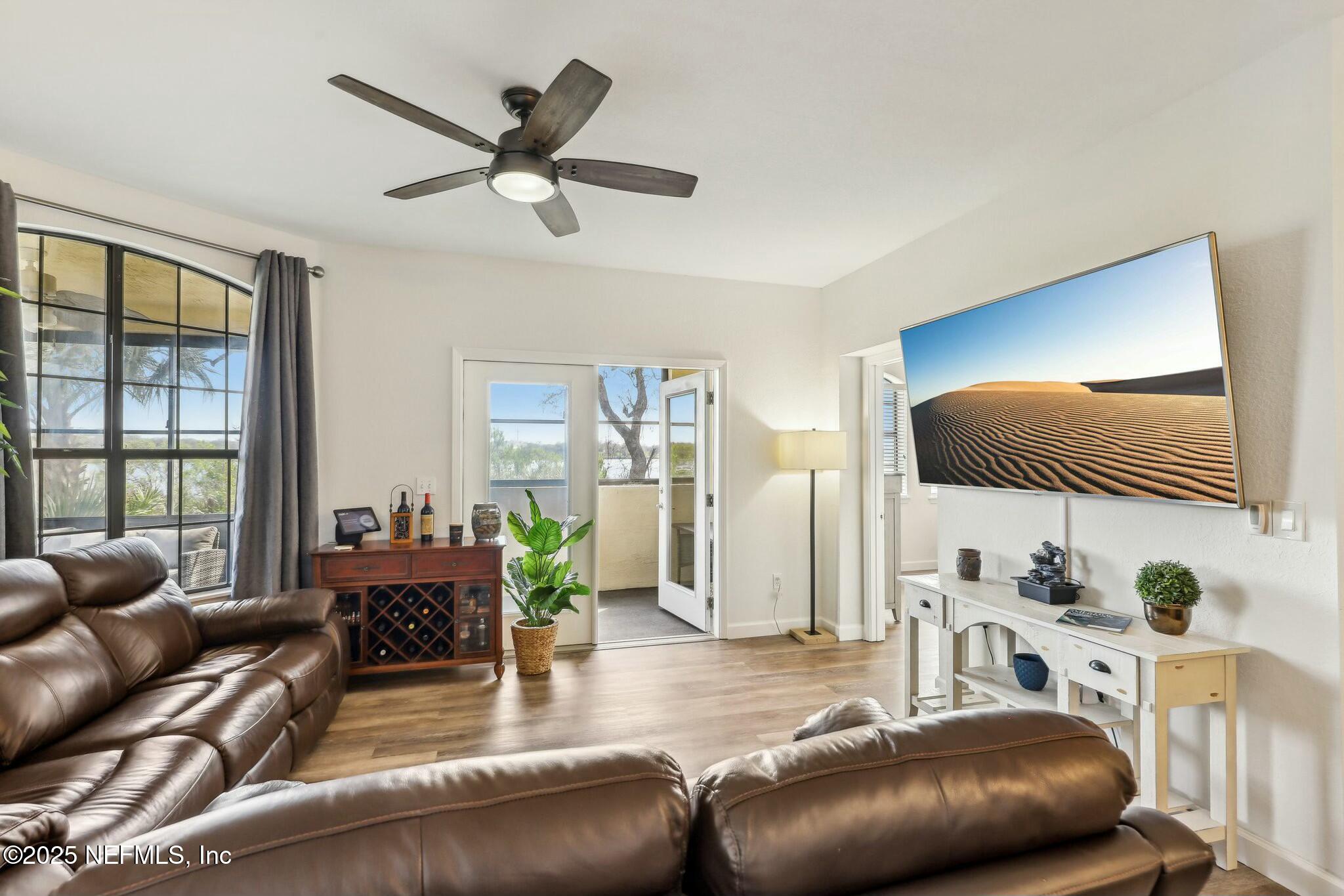 2102 Vista Cove Road St. Augustine, FL 32084 - Photo 1 of 40 a living room with furniture and a large window