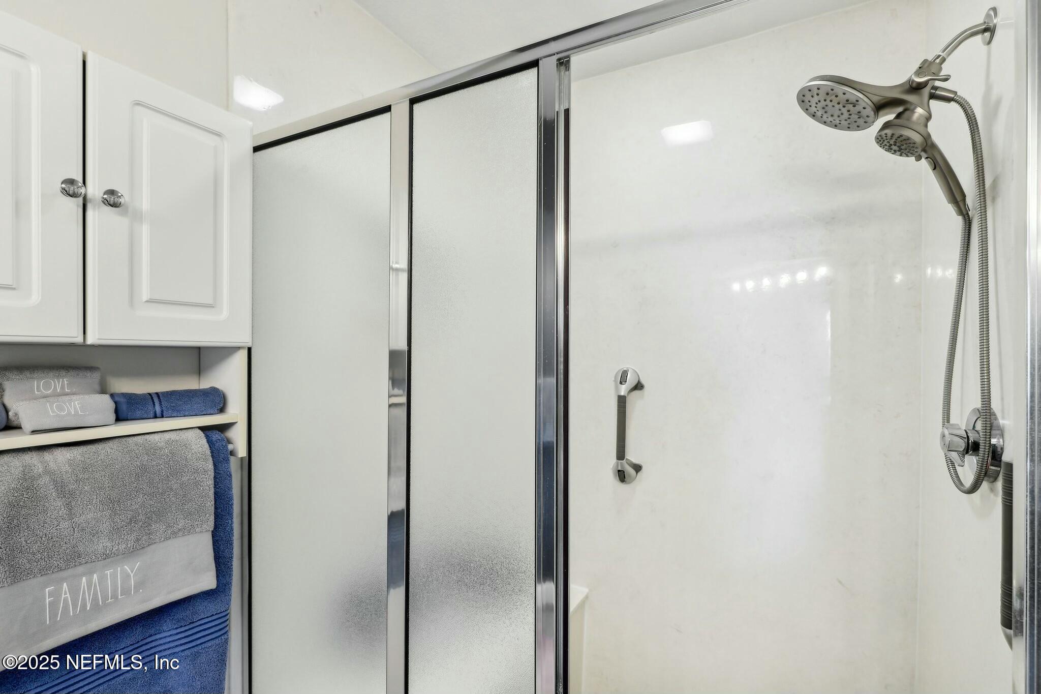 2102 Vista Cove Road St. Augustine, FL 32084 - Photo 25 of 40 a bathroom with a shower