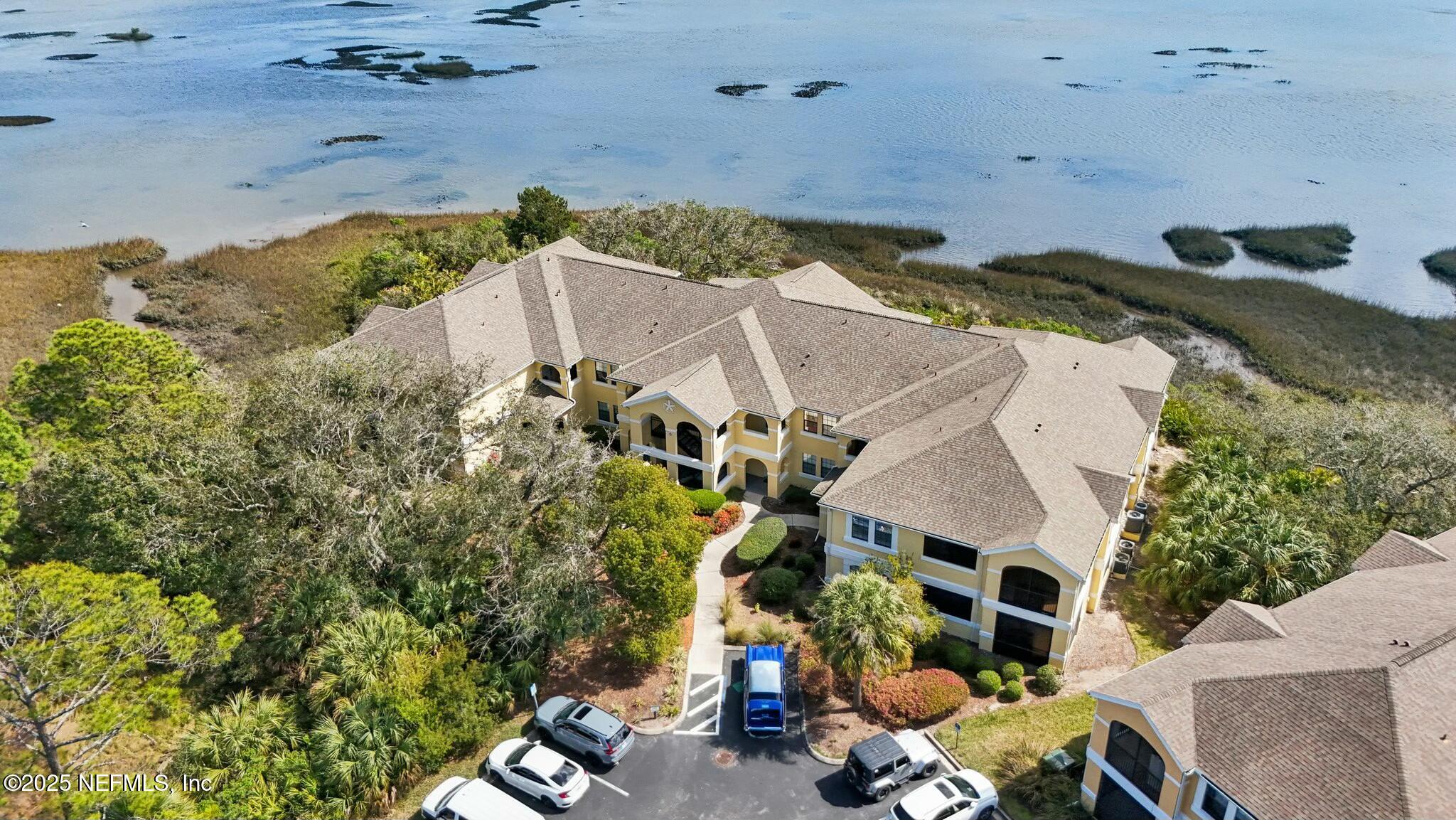 2102 Vista Cove Road St. Augustine, FL 32084 - Photo 29 of 40 an aerial view of a house with a yard