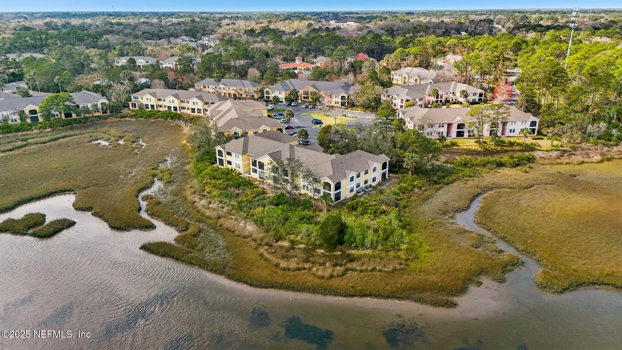 2102 Vista Cove Road St. Augustine, FL 32084 - Photo 30 of 40 a view of a lake with a mountain in the background