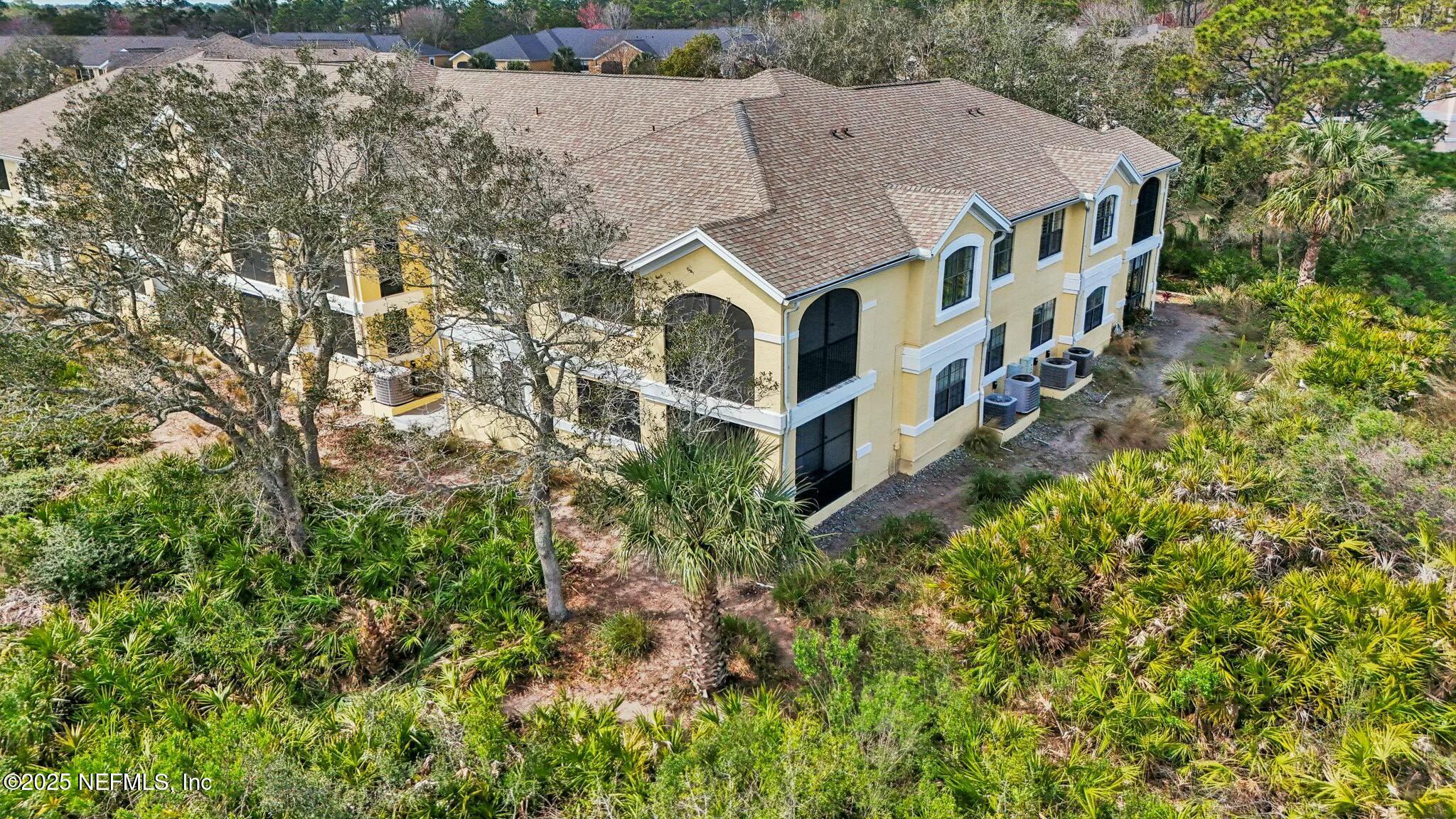 2102 Vista Cove Road St. Augustine, FL 32084 - Photo 35 of 40 an aerial view of a house with a yard