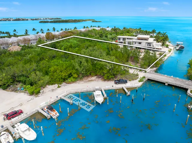 a view of a balcony with chairs
