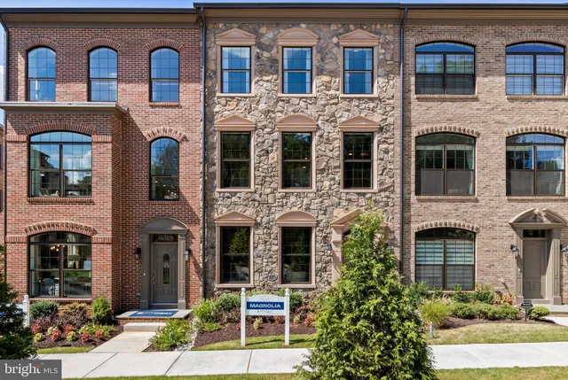 a front view of a multi story residential apartment building