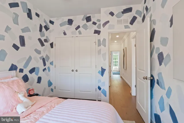 a view of two chairs in the balcony