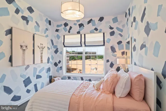 a view of a brick building next to a yard