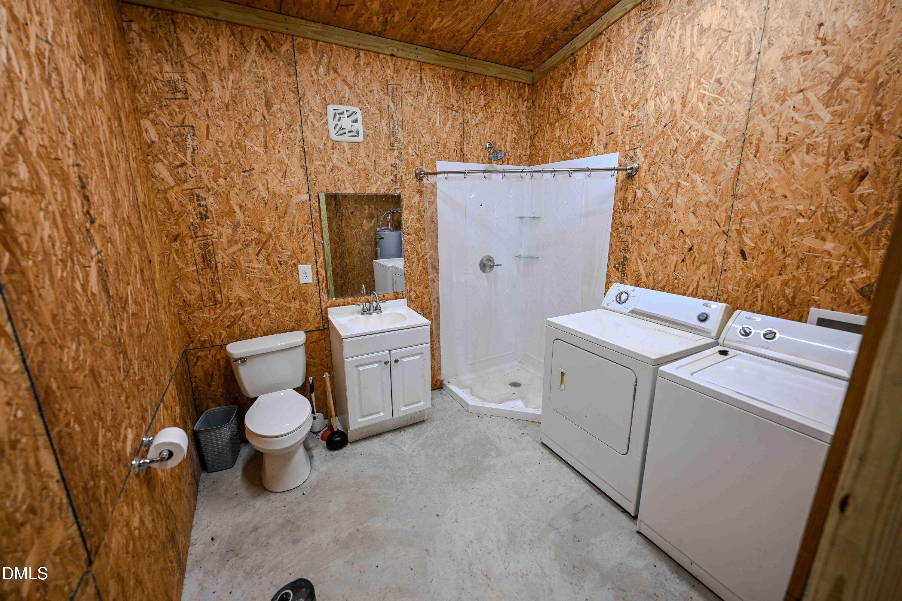 2729 McNeill Hobbs Road Bunnlevel, NC 28323 - Photo 13 of 75 a utility room with dryer and washer