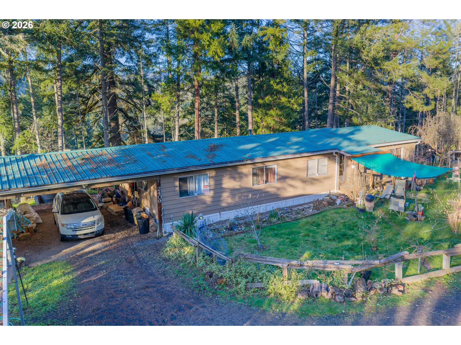 2409 Ireland Road Winston, OR 97496 - Photo 1 of 39 a view of an outdoor space
