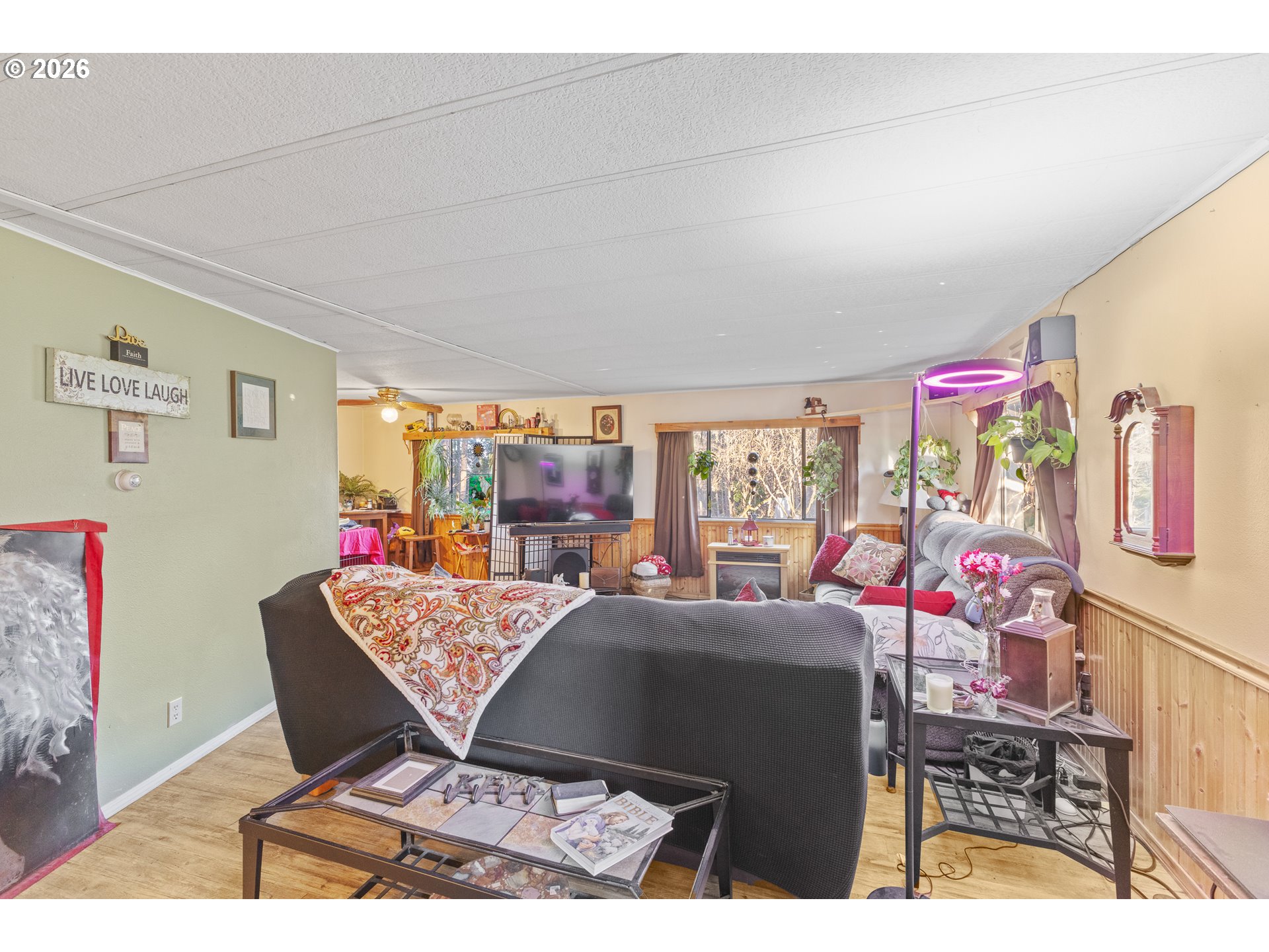 2409 Ireland Road Winston, OR 97496 - Photo 19 of 39 a living room with furniture and a table