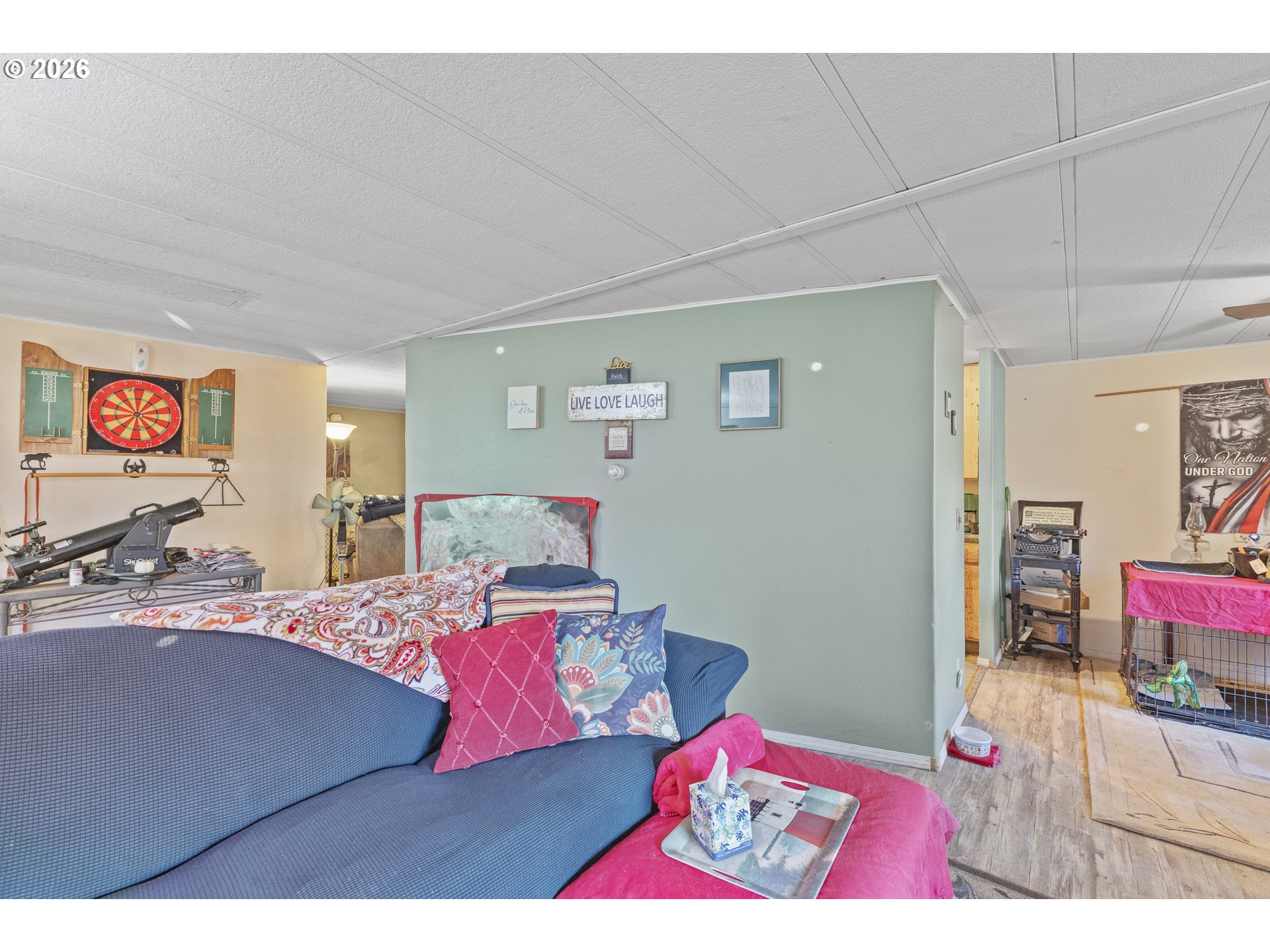 2409 Ireland Road Winston, OR 97496 - Photo 22 of 39 a living room with furniture and a table