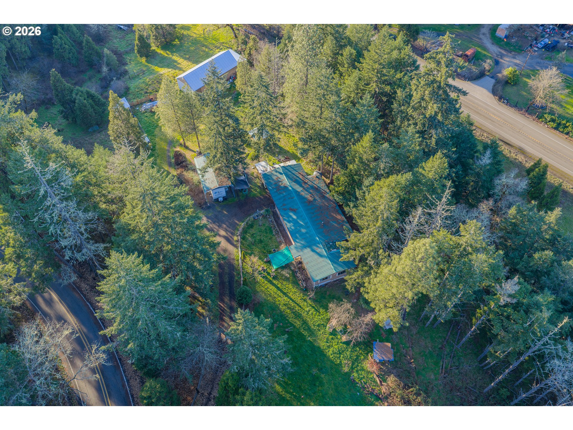 2409 Ireland Road Winston, OR 97496 - Photo 3 of 39 a aerial view of a house with a yard