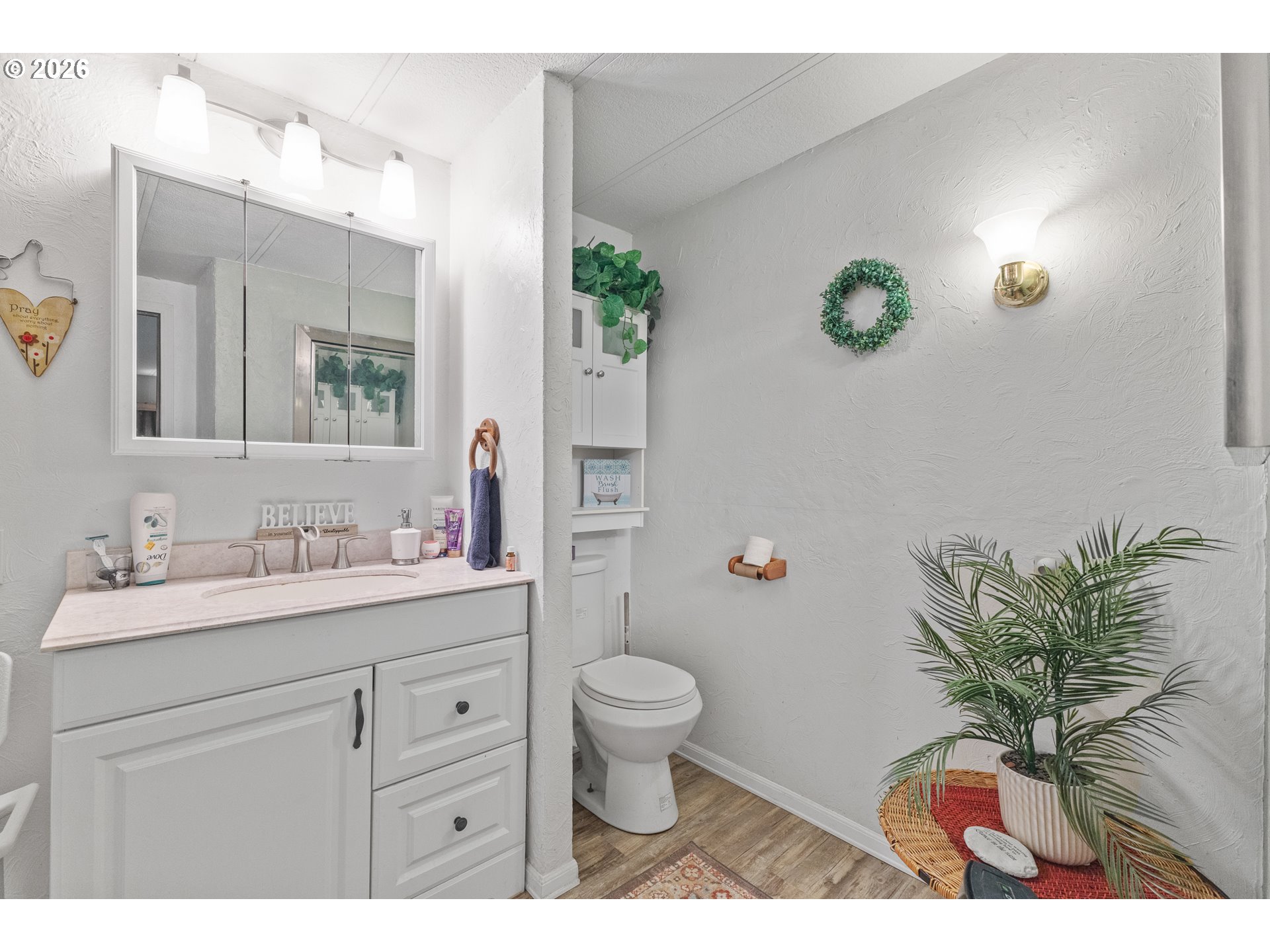 2409 Ireland Road Winston, OR 97496 - Photo 34 of 39 a bathroom with a toilet sink and mirror