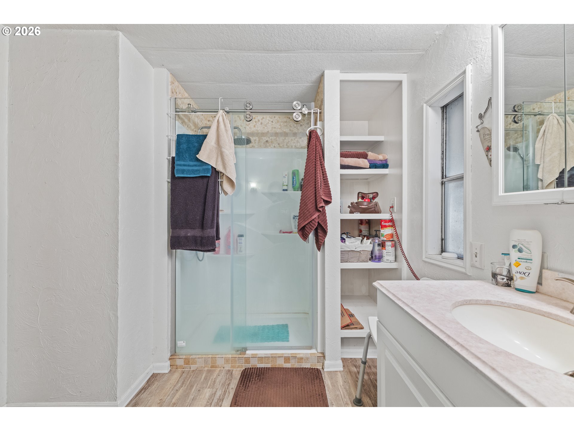 2409 Ireland Road Winston, OR 97496 - Photo 35 of 39 a bathroom with a sink a toilet and shower