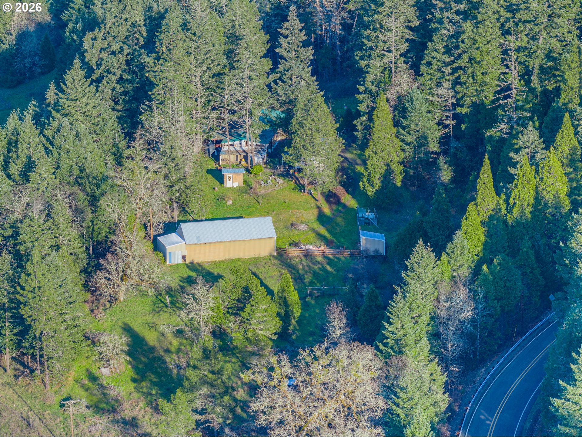2409 Ireland Road Winston, OR 97496 - Photo 4 of 39 an aerial view of a house with a yard