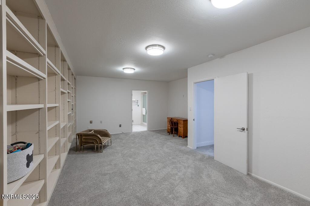 4811 Lakeridge Terrace West Reno, NV 89509 - Photo 36 of 43 a view of a livingroom with a furniture and storage