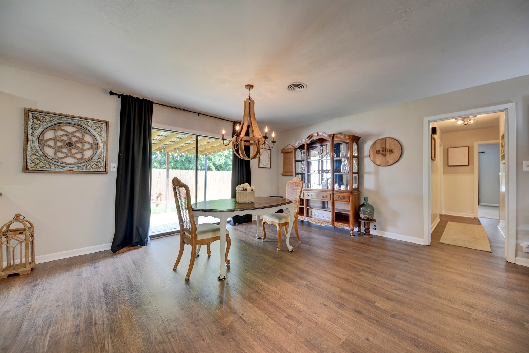 507 Sandra Drive Brenham, TX 77833 - Photo 13 of 30 a view of a dining room with furniture window and wooden floor