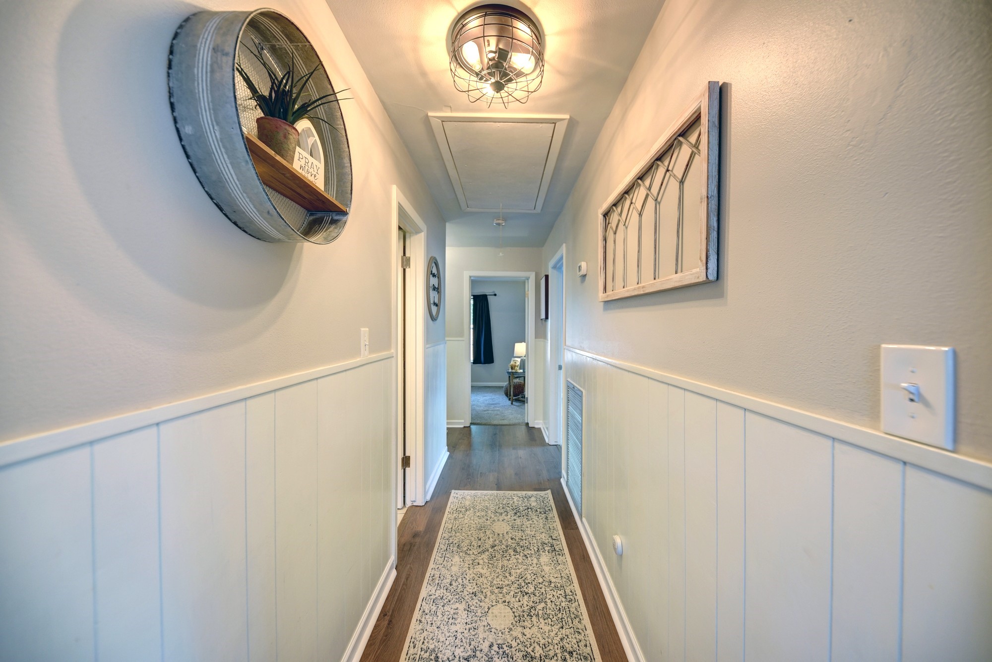 507 Sandra Drive Brenham, TX 77833 - Photo 24 of 30 a view of a hallway with windows