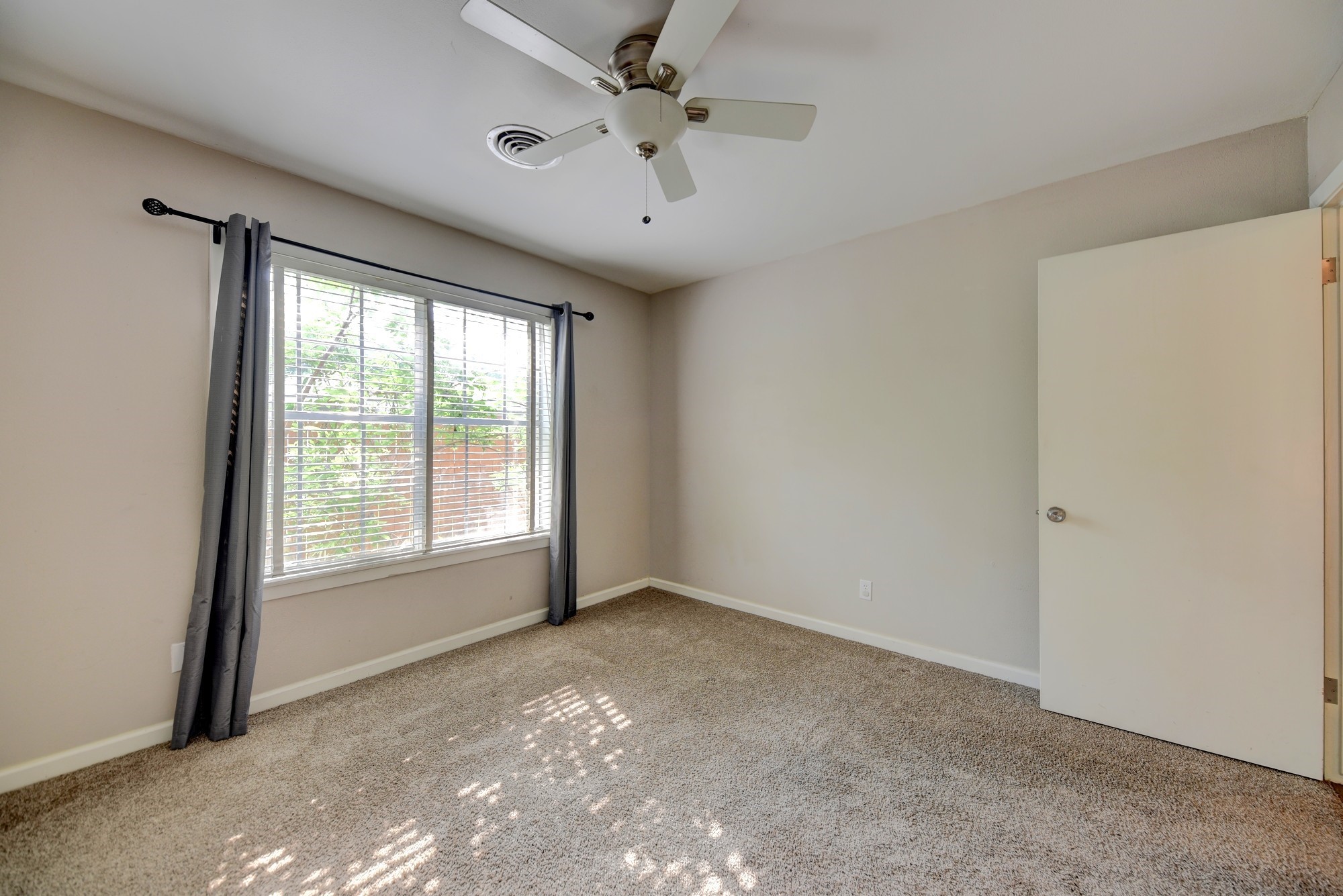507 Sandra Drive Brenham, TX 77833 - Photo 29 of 30 a view of an empty room with a window