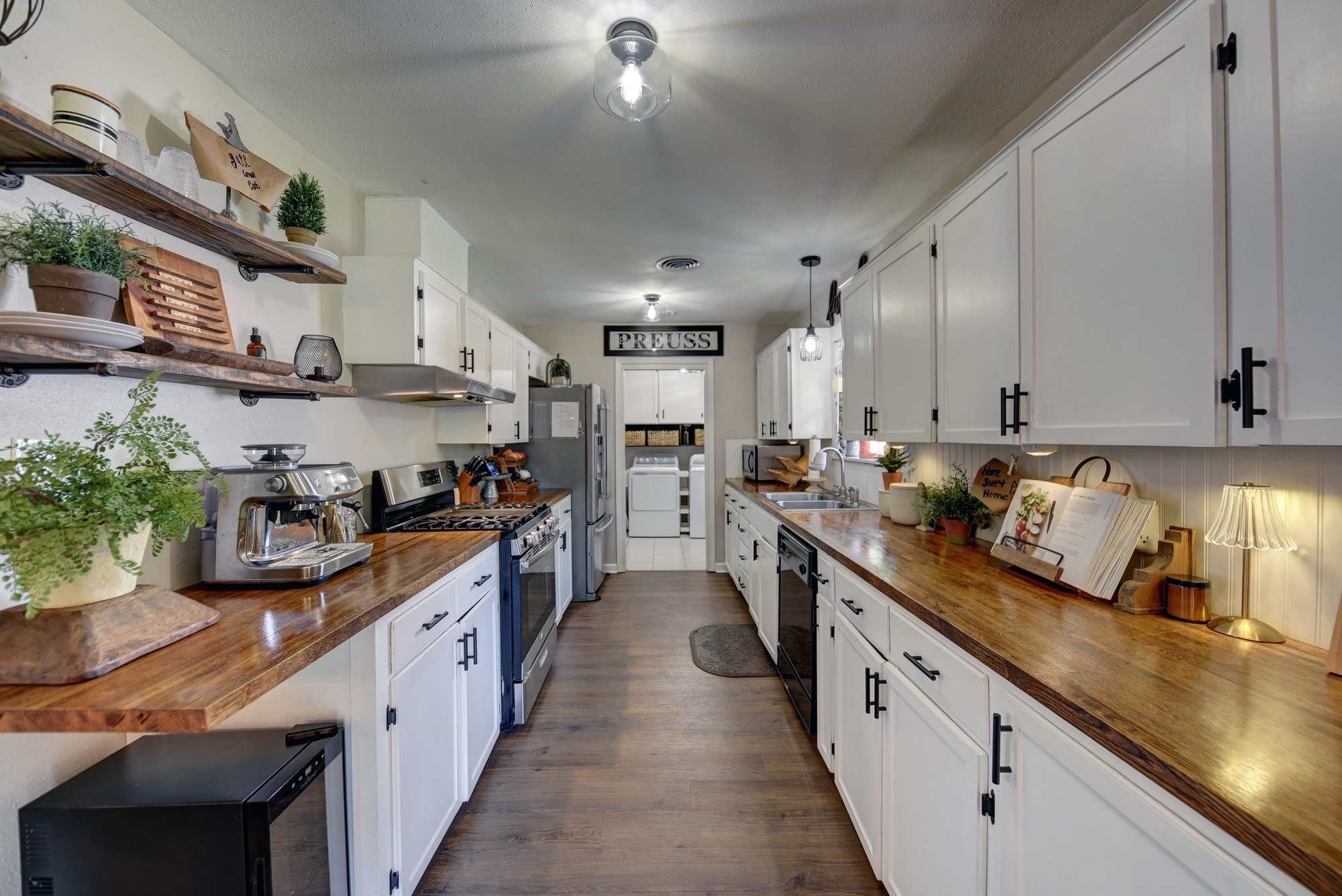 507 Sandra Drive Brenham, TX 77833 - Photo 3 of 30 a large kitchen with stainless steel appliances lots of counter space and a sink