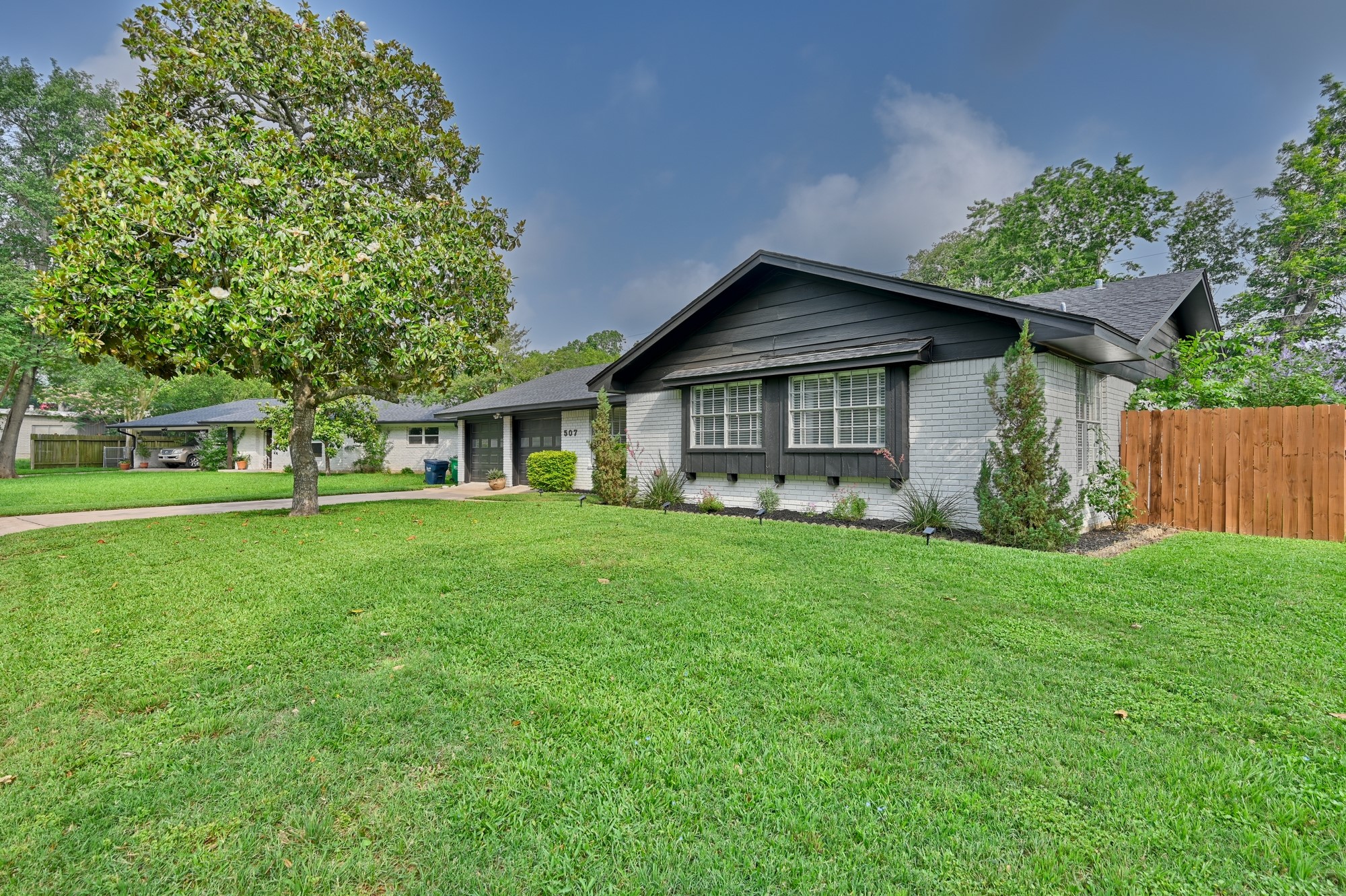 507 Sandra Drive Brenham, TX 77833 - Photo 5 of 30 a front view of house with yard and green space
