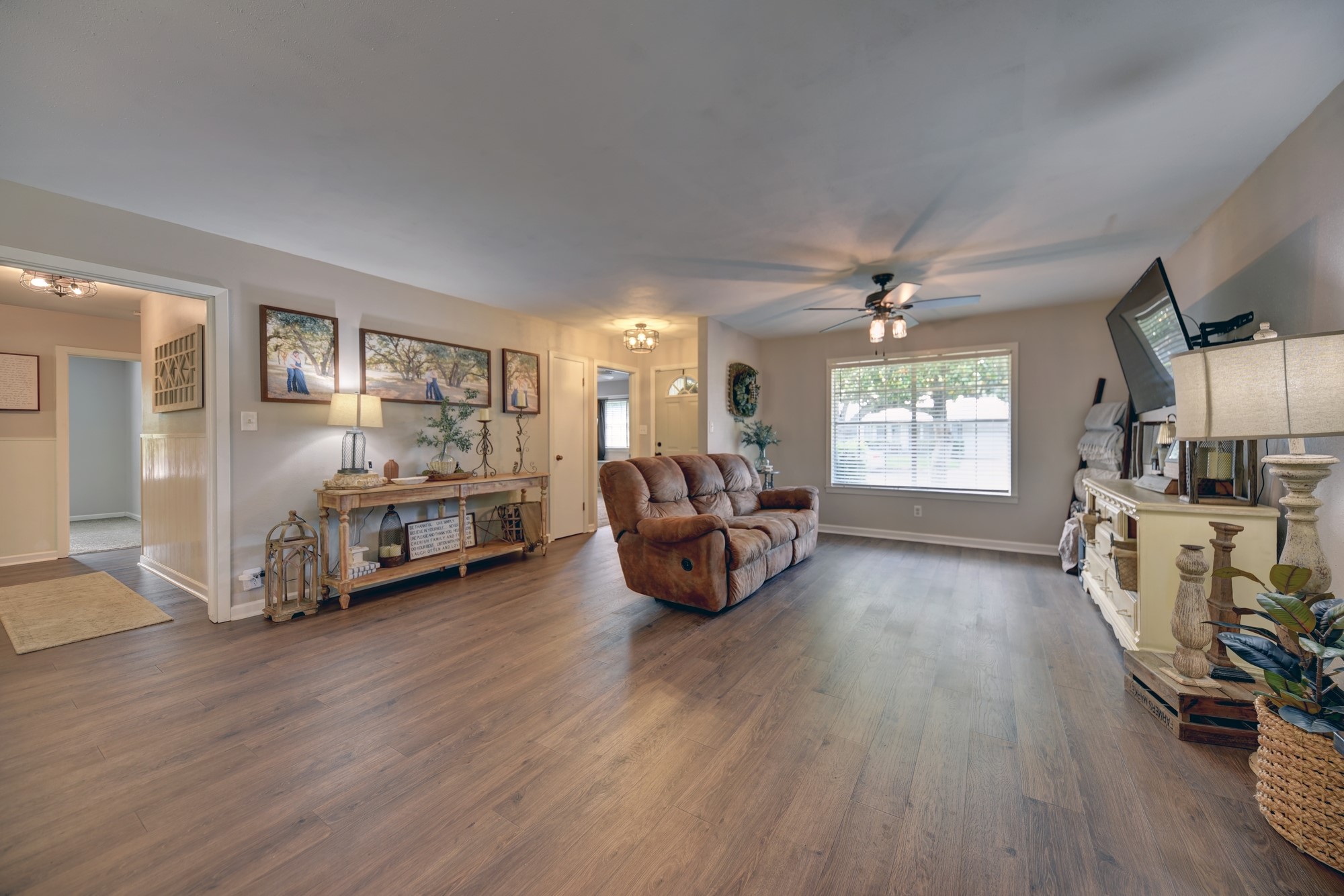 507 Sandra Drive Brenham, TX 77833 - Photo 8 of 30 a living room with furniture and a wooden floor