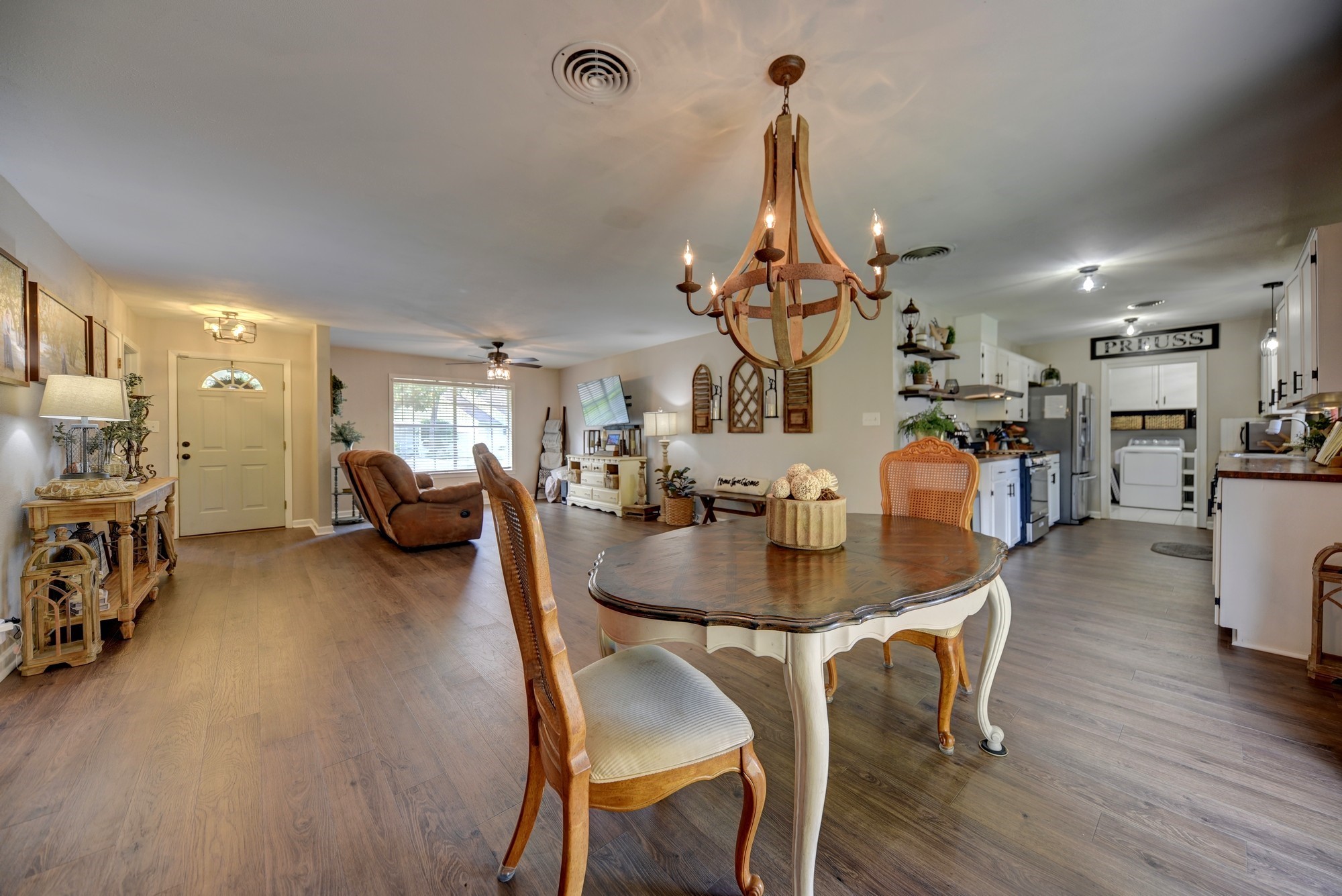 507 Sandra Drive Brenham, TX 77833 - Photo 10 of 30 a view of a dining room with furniture and wooden floor