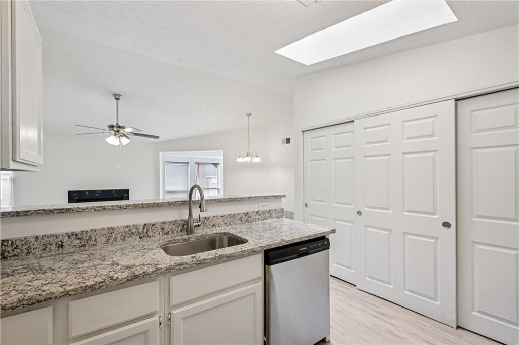 4263 Parkview Court Stone Mountain, GA 30083 - Photo 14 of 31 a kitchen with a sink and cabinets