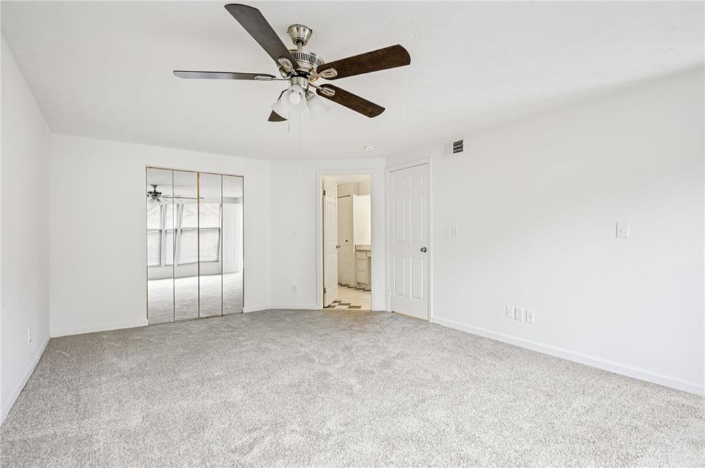 4263 Parkview Court Stone Mountain, GA 30083 - Photo 21 of 31 a view of an empty room with a window