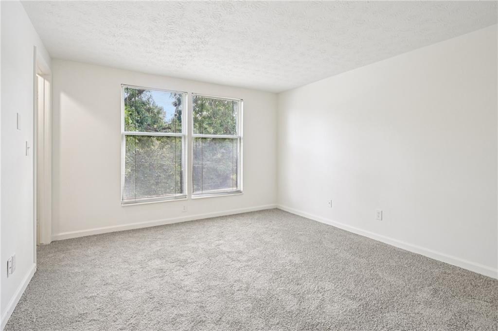 4263 Parkview Court Stone Mountain, GA 30083 - Photo 24 of 31 an empty room with a window