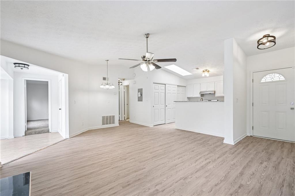 4263 Parkview Court Stone Mountain, GA 30083 - Photo 5 of 31 a view of a kitchen with wooden floor