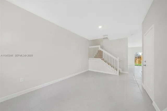 a view of an entryway with stairs