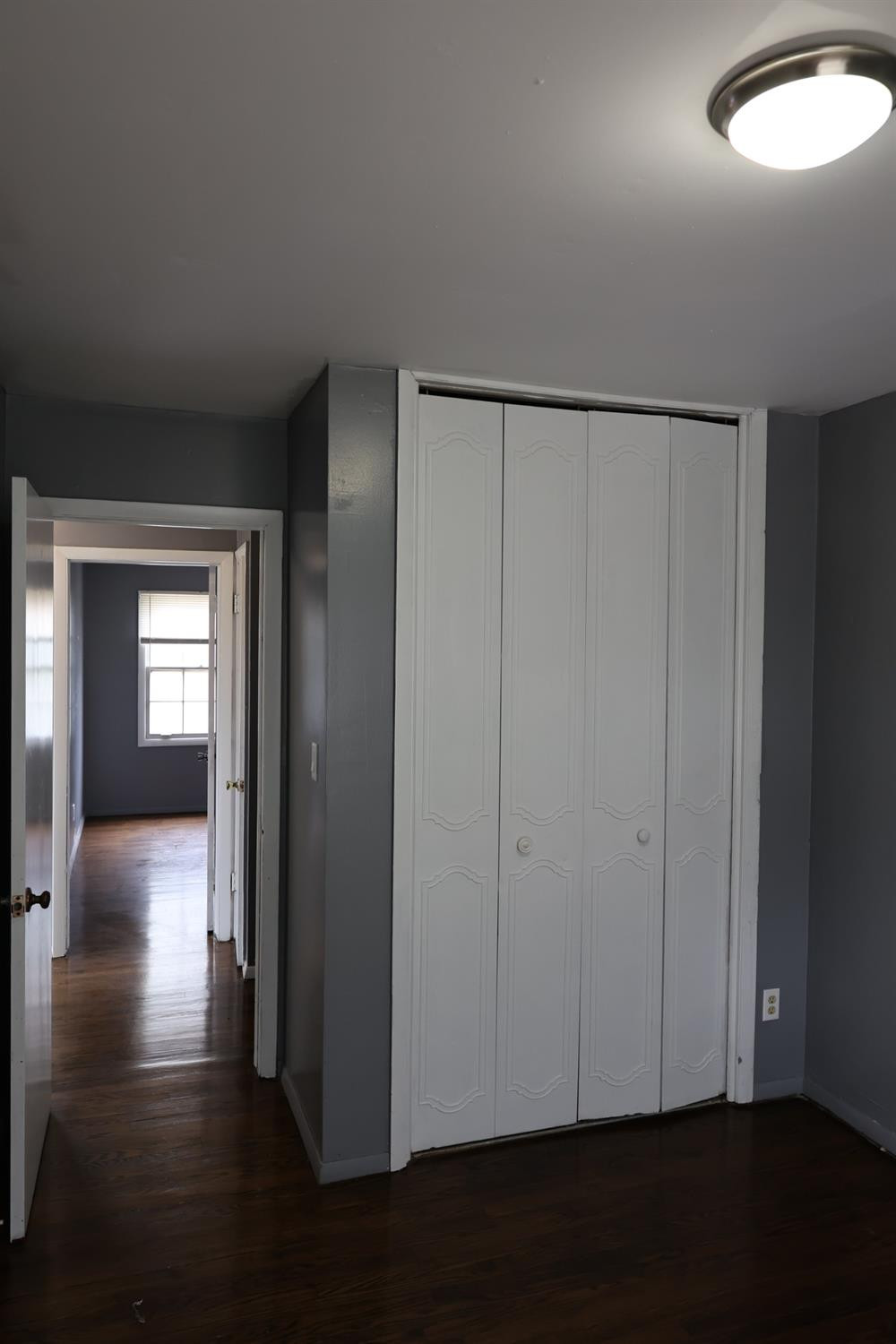 1543 Tennessee Street Gary, IN 46407 - Photo 11 of 22 a view of a hallway with wooden floor