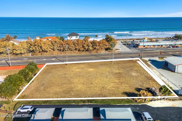 a view of swimming pool from a balcony