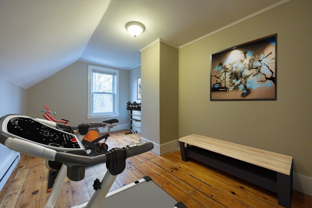 12 1st Street, Unit 12 Ipswich, MA 01938 - Photo 34 of 42 a living room with a couch and a window
