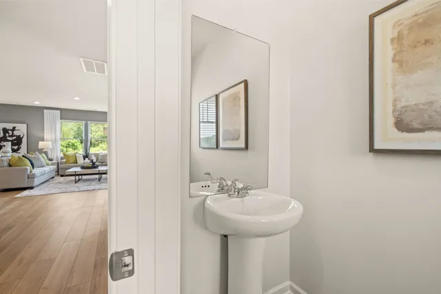 a view of kitchen dining table chairs microwave and cabinets