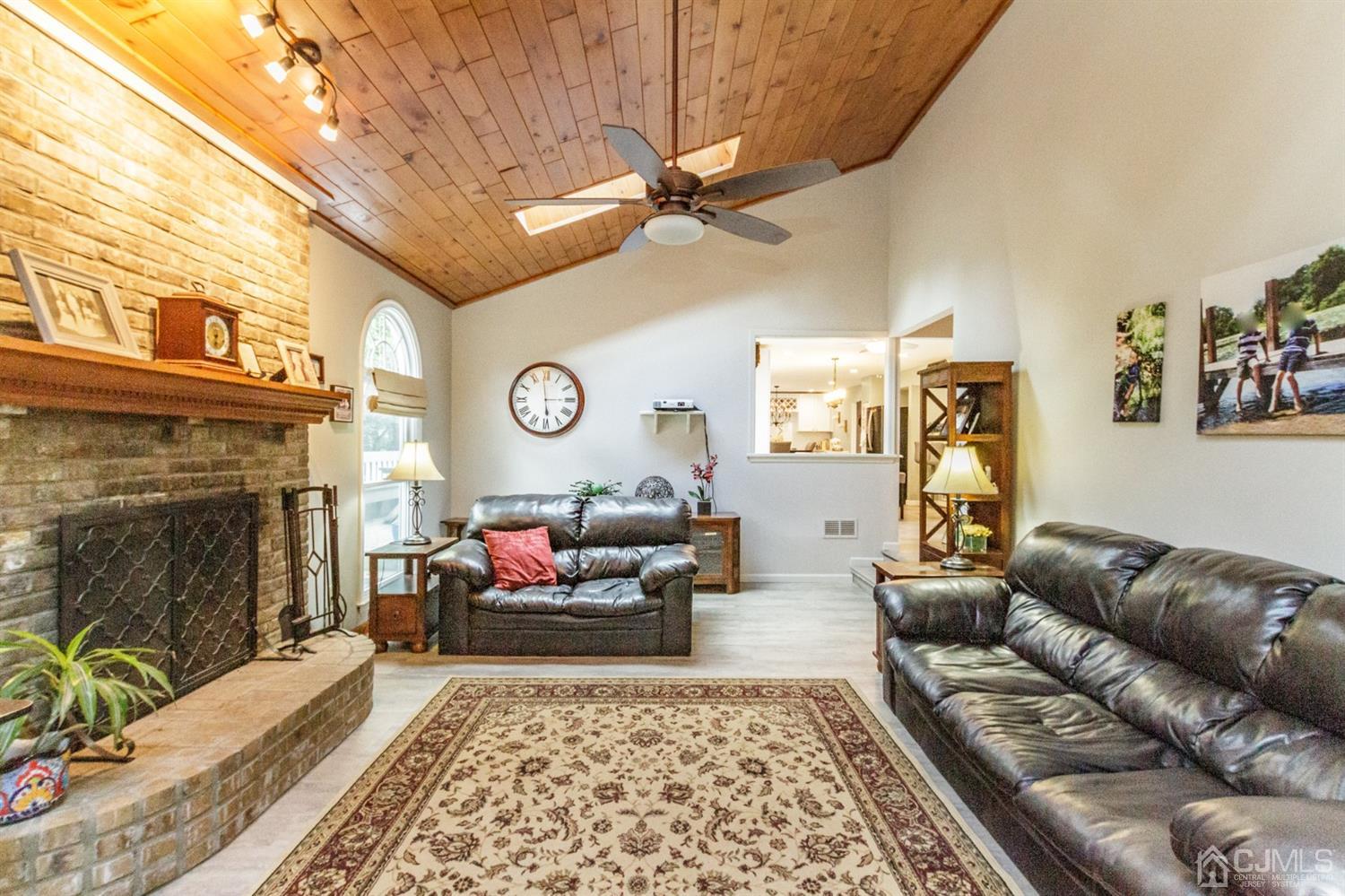66 Rustic Trail Flemington, NJ 08822 - Photo 16 of 37 a living room with furniture and a fireplace