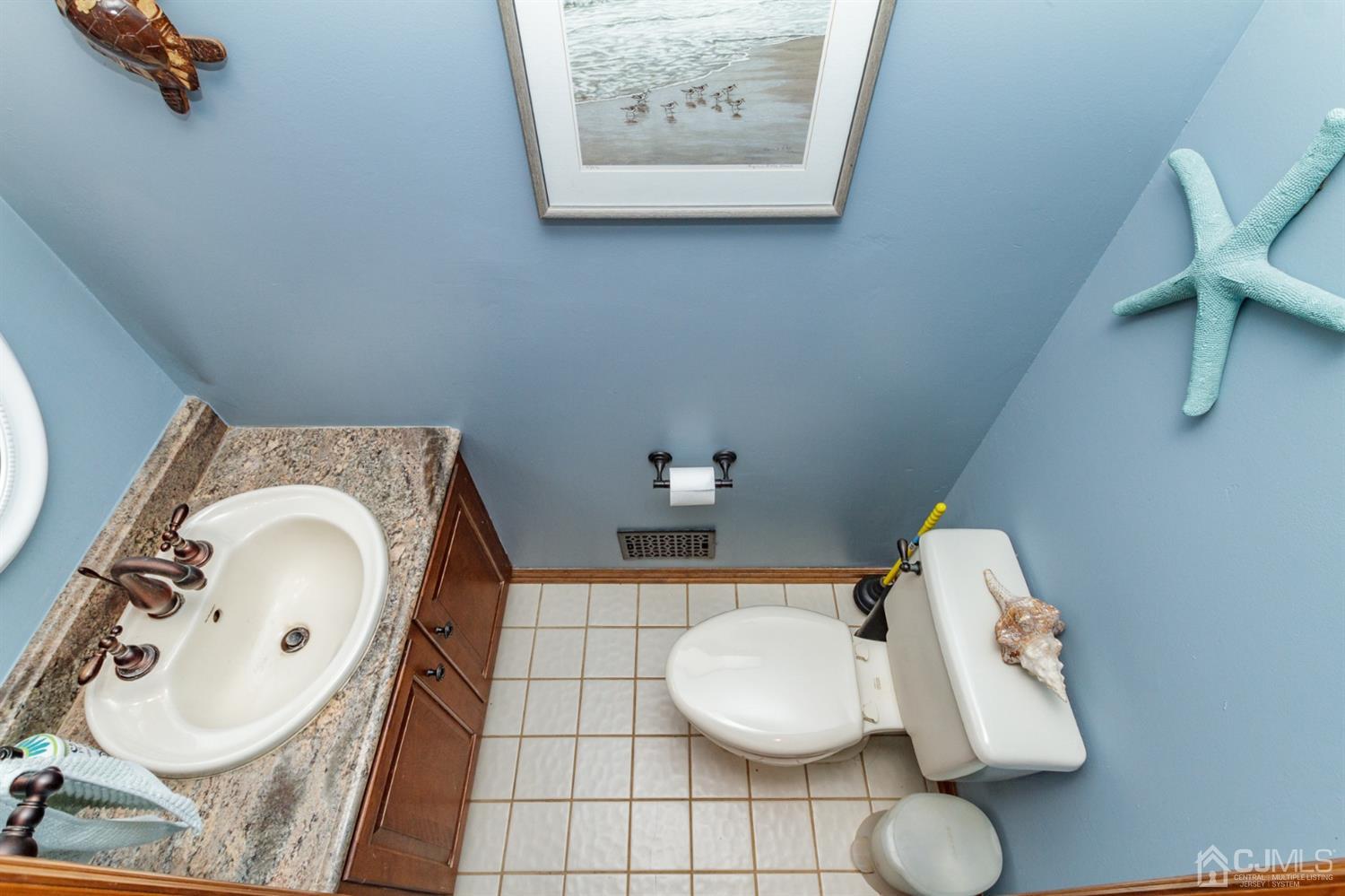 66 Rustic Trail Flemington, NJ 08822 - Photo 19 of 37 a bathroom with a sink mirror and toilet
