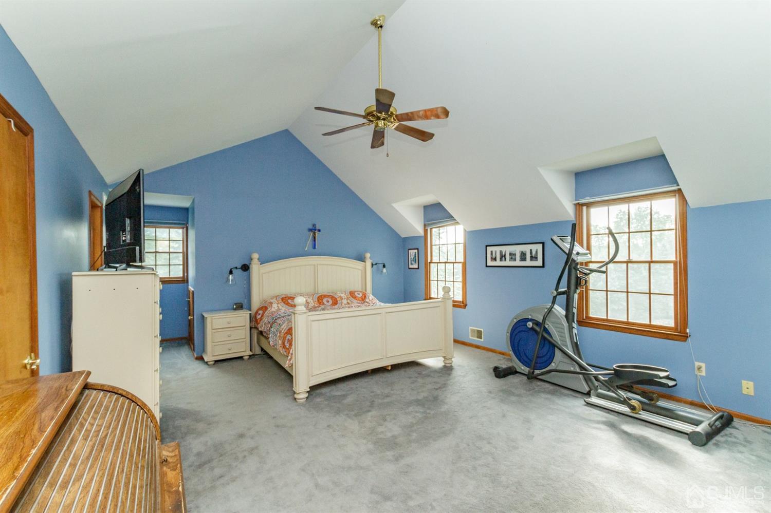 66 Rustic Trail Flemington, NJ 08822 - Photo 20 of 37 a living room with furniture gym equipment and a window