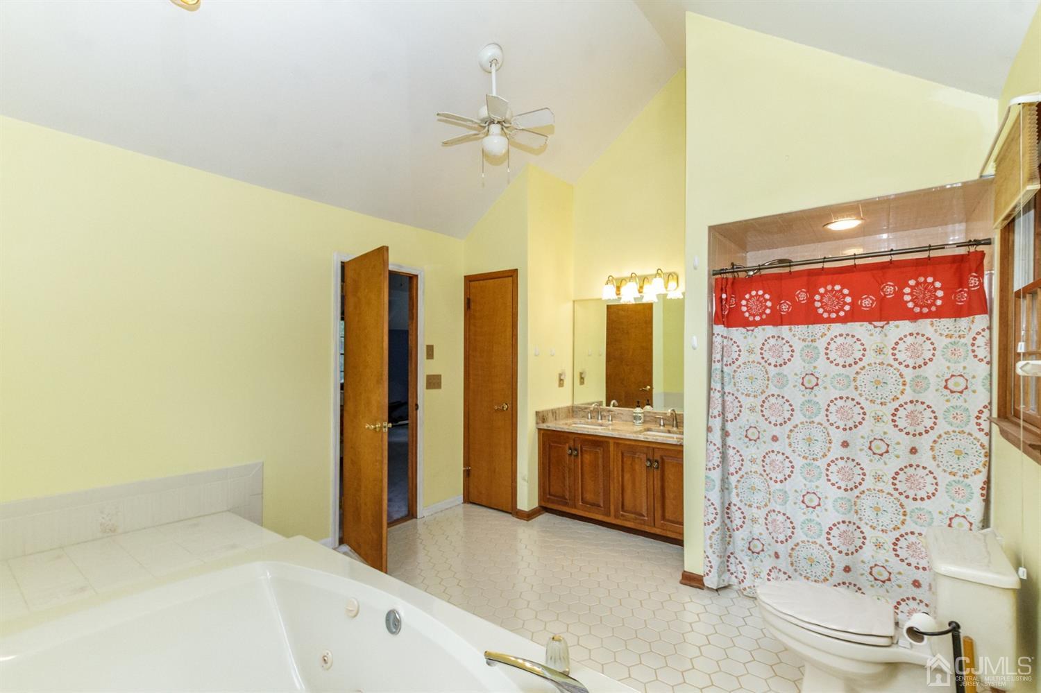 66 Rustic Trail Flemington, NJ 08822 - Photo 23 of 37 a bathroom with a bathtub and a shower