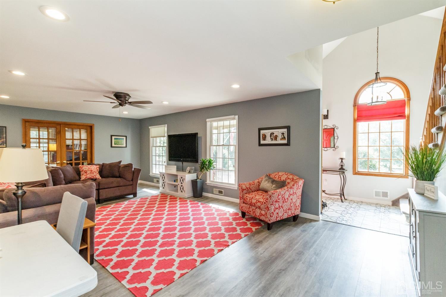 66 Rustic Trail Flemington, NJ 08822 - Photo 4 of 37 a living room with furniture fireplace and flat screen tv