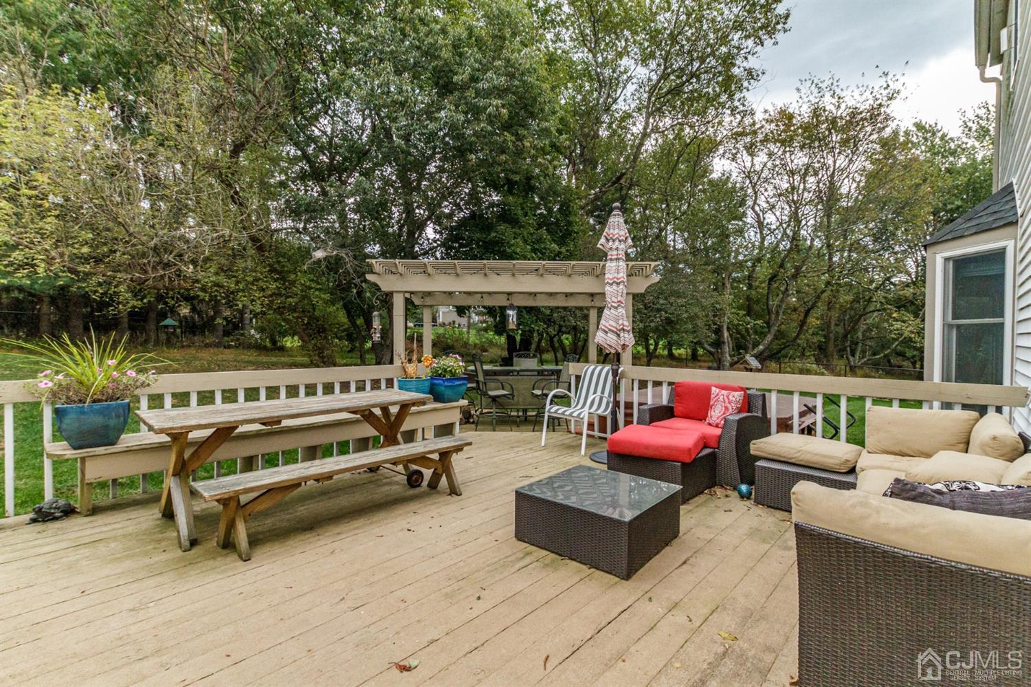 66 Rustic Trail Flemington, NJ 08822 - Photo 32 of 37 a patio with patio table and chairs