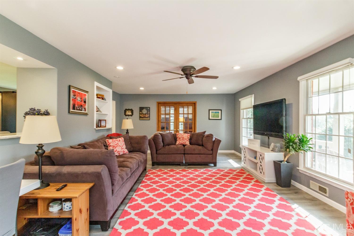 66 Rustic Trail Flemington, NJ 08822 - Photo 5 of 37 a living room with furniture and a flat screen tv