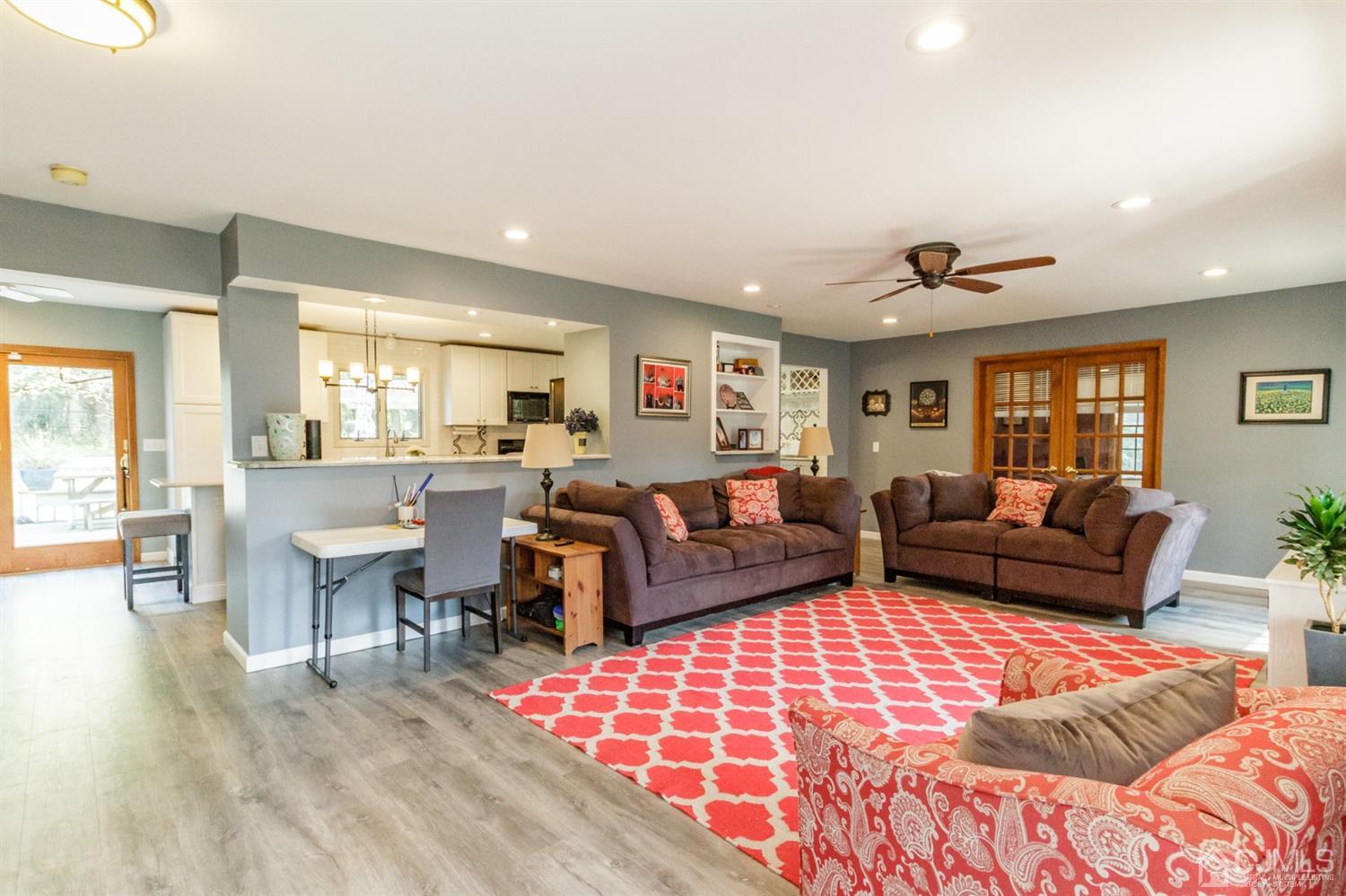 66 Rustic Trail Flemington, NJ 08822 - Photo 6 of 37 a living room with furniture ceiling fan and a rug