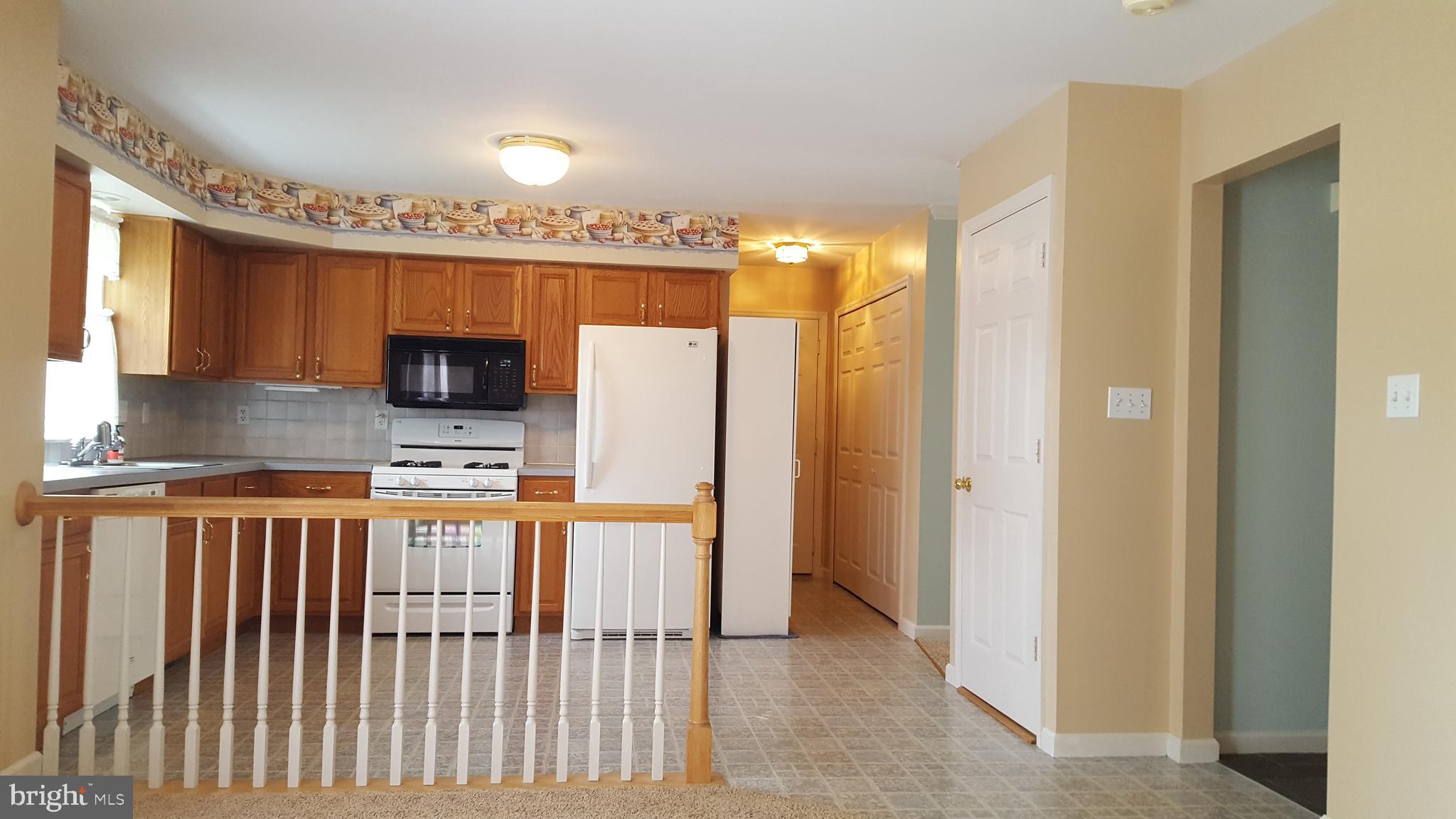 115 Olde Hickory Road Mount Wolf, PA 17347 - Photo 9 of 63 Family room to KItchen