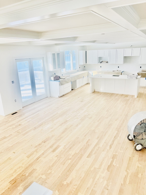 55 Widow Rites Lane Sudbury, MA 01776 - Photo 4 of 39 a large white bed in a white room