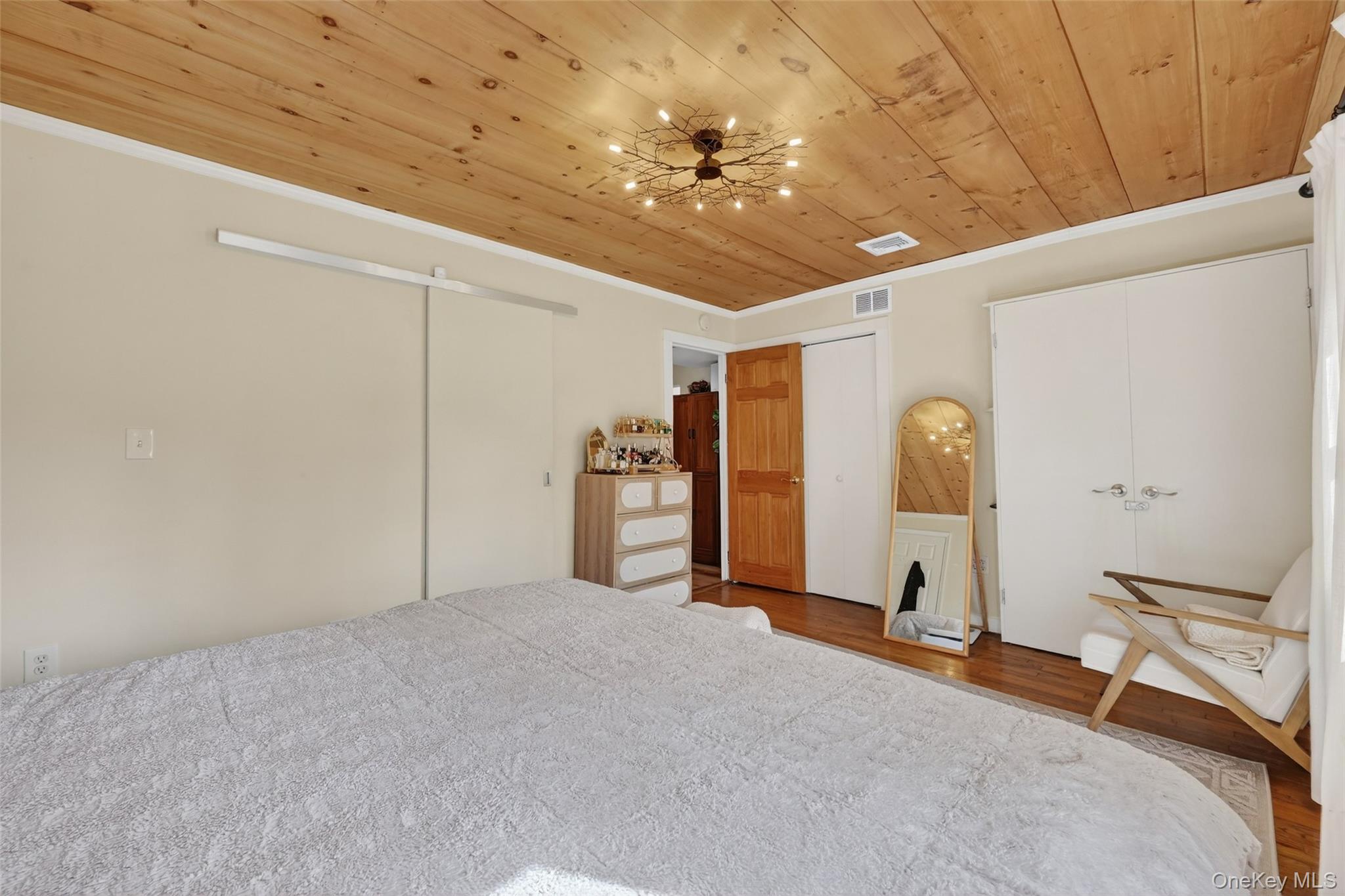 96 Lower Wisner Road Warwick, NY 10990 - Photo 22 of 34 Warm wood-finish ceiling featuring a unique branch-inspired light fixture