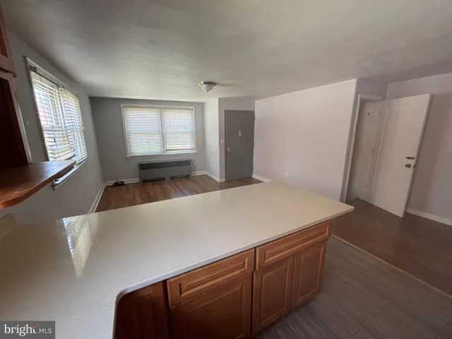 a room with a bed and a window