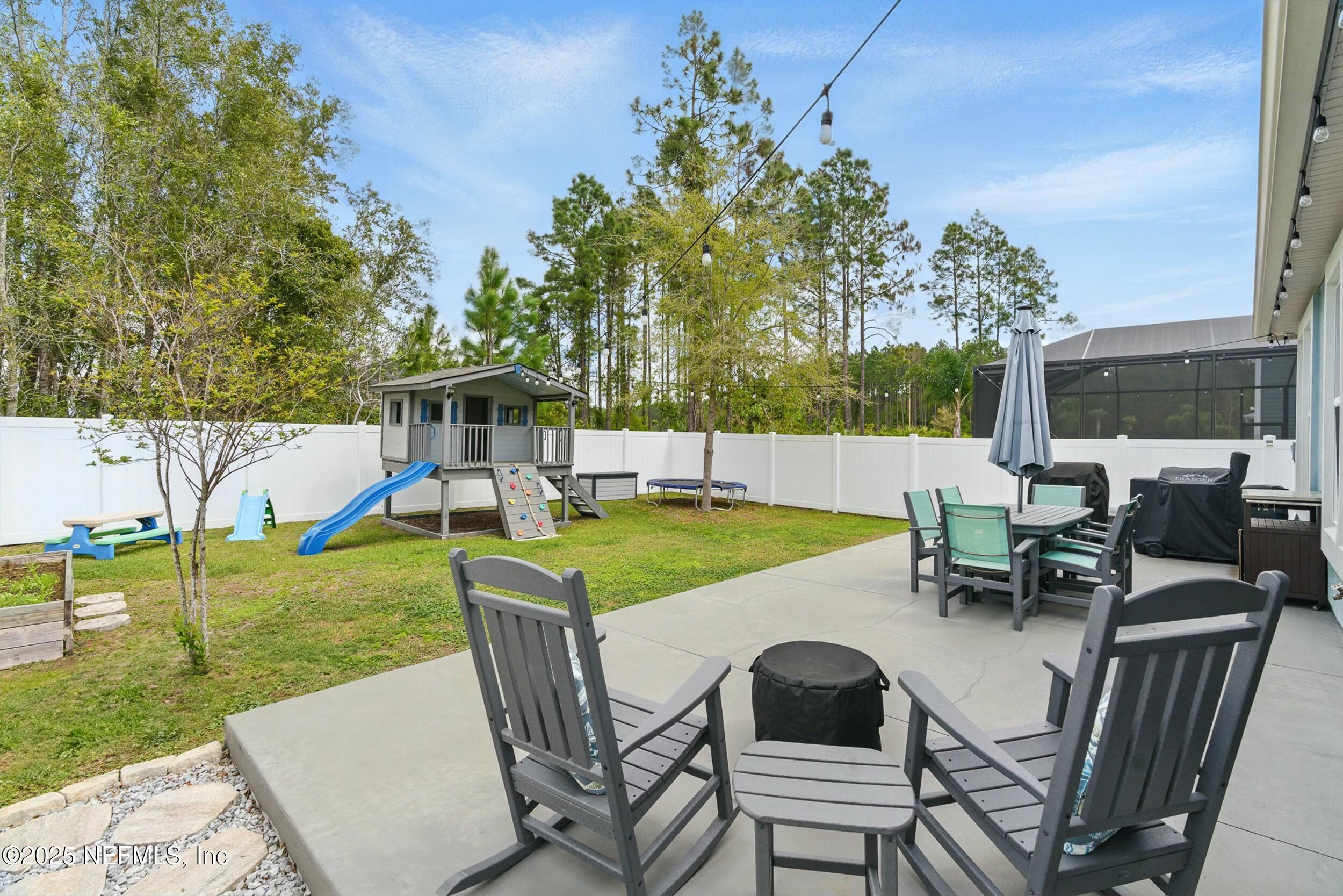 30 Cloverbrook Road St. Johns, FL 32259 - Photo 25 of 69 a view of a patio with swimming pool